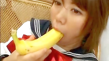 Nippon schoolgirl with a banana-filled snatch screams 'Oh fuck' in Tokyo XXX playroom.