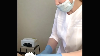 The patient CUM powerfully during the examination procedure in the doctor's hands