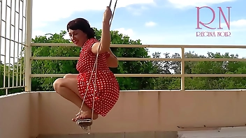 Cute housewife has fun without panties on the swing. Slut swings and shows her perfect pussy. c1